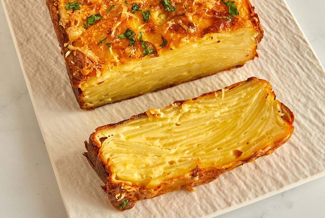 Détail du mille-feuille de pommes de terre fondant au Comté